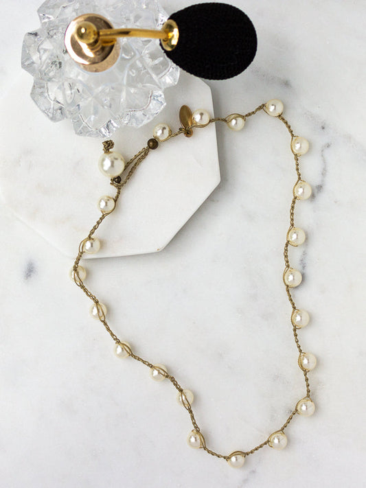 Wear this classic, handstitched pearl necklace basic with anything in your closet!