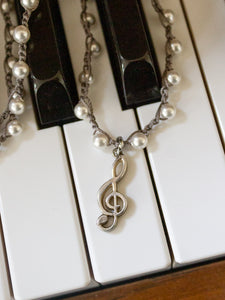 Vintage sterling silver treble clef necklace for a concert pianist!